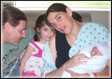March 2012 WOW Gal Candace Armenti with Husband and Daughter